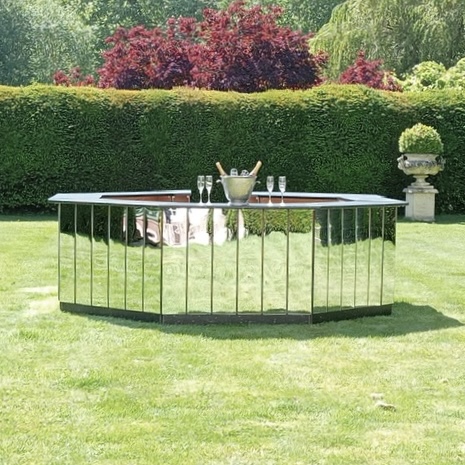 Mirrored circular bar available to hire